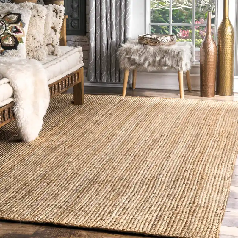 Handwoven-jute-rug-with-a-subtle-pattern-perfect-for-creating-a-cozy-and-inviting-atmosphere